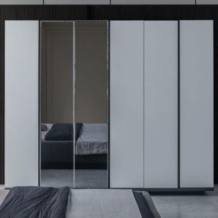 Vals stylish wardrobe with drawers, providing contemporary storage options and a streamlined look.